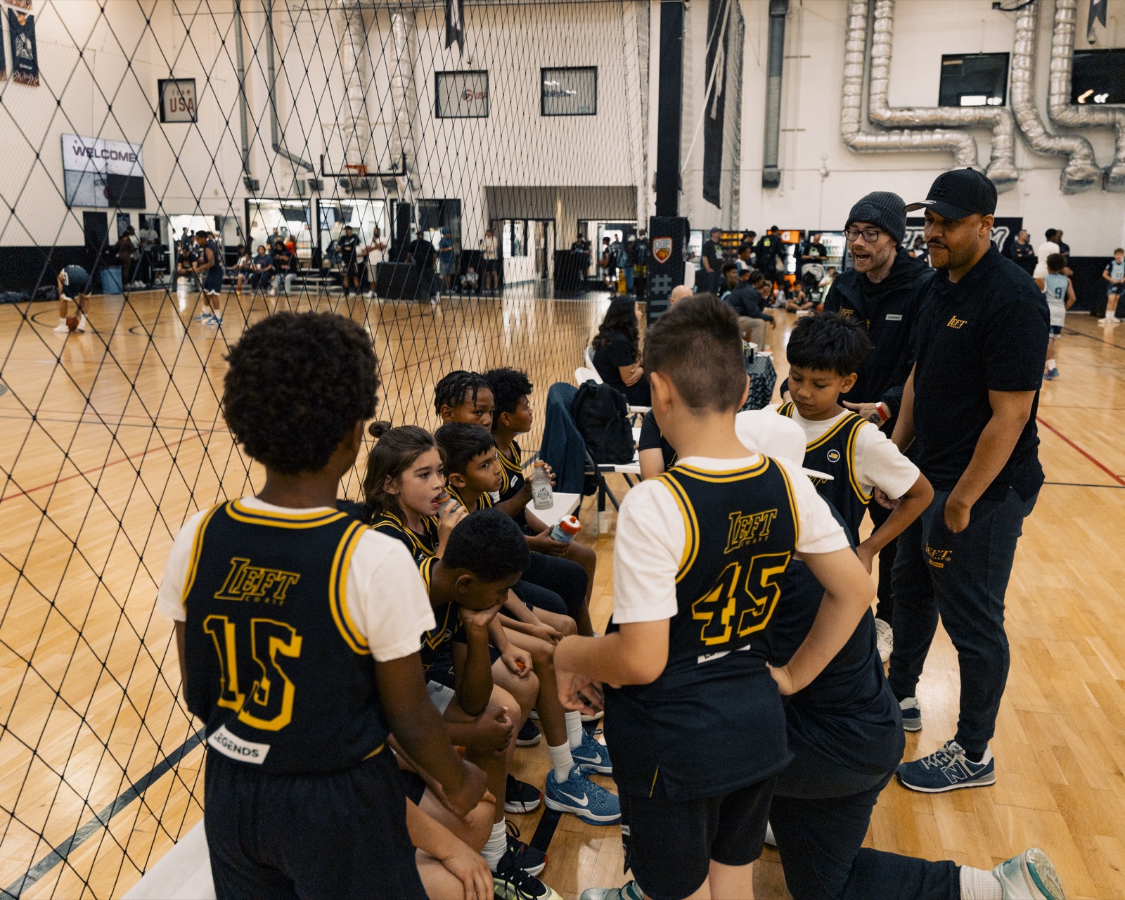 Team huddle with coaches