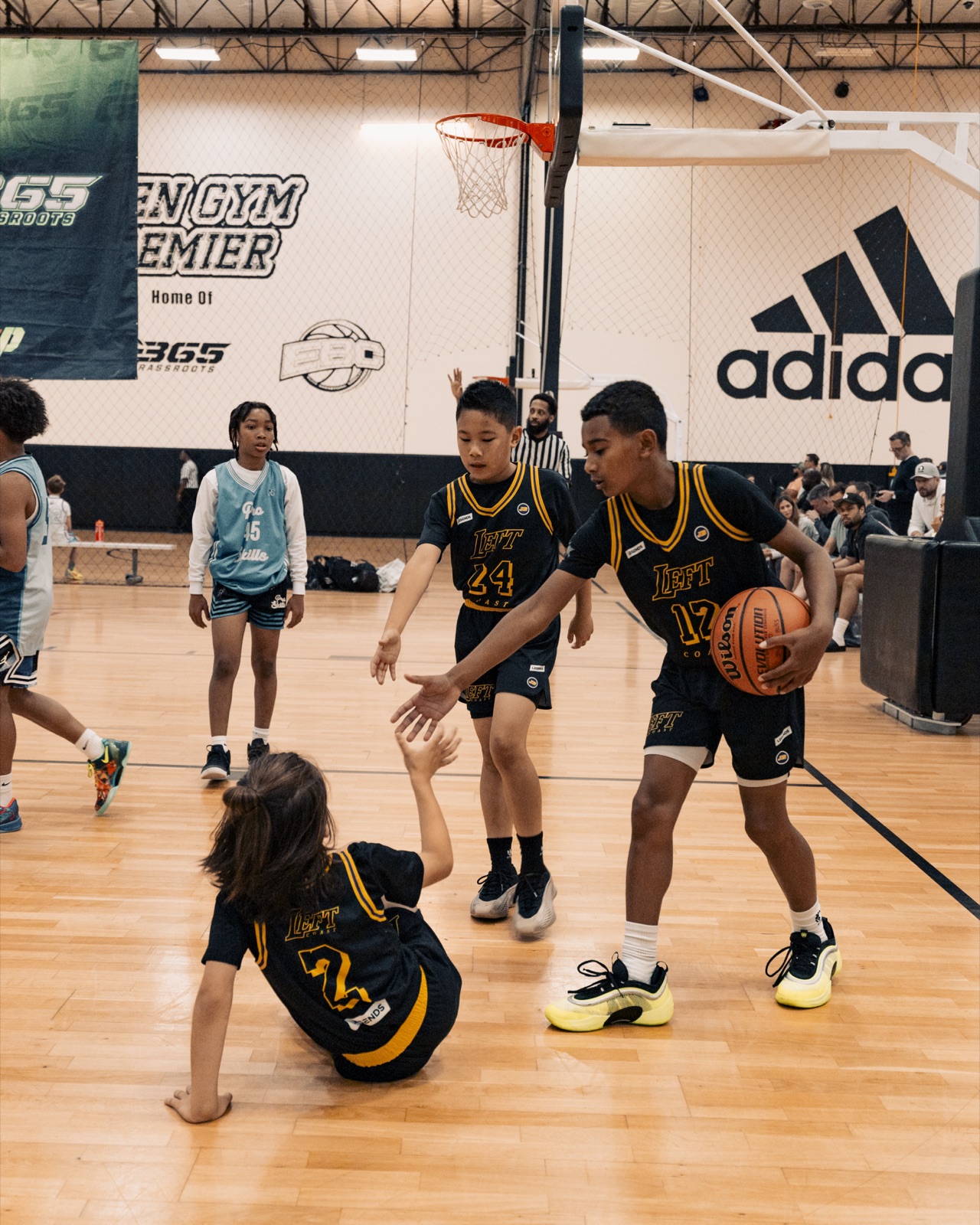 Player helping teammate up