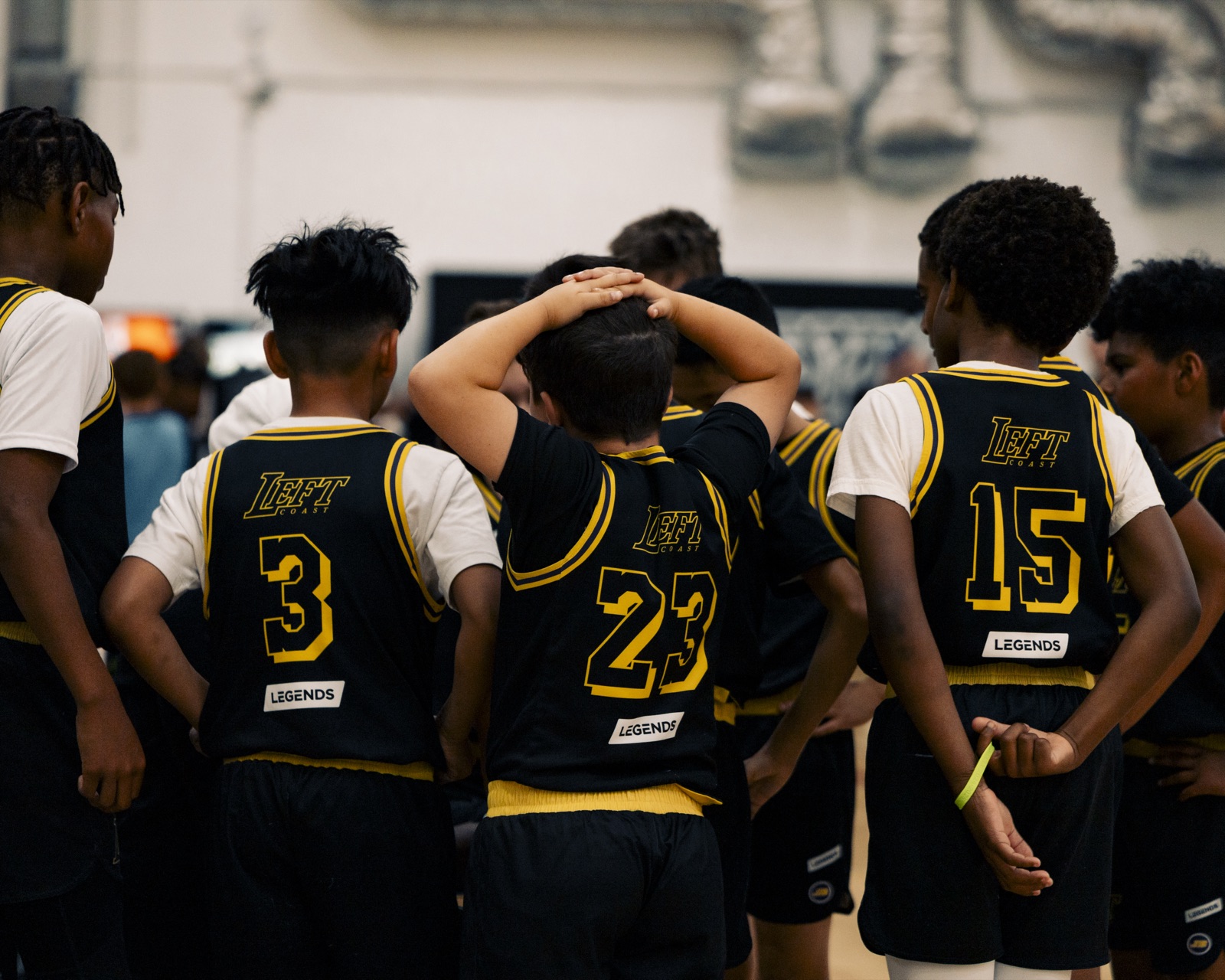 Team huddle from behind